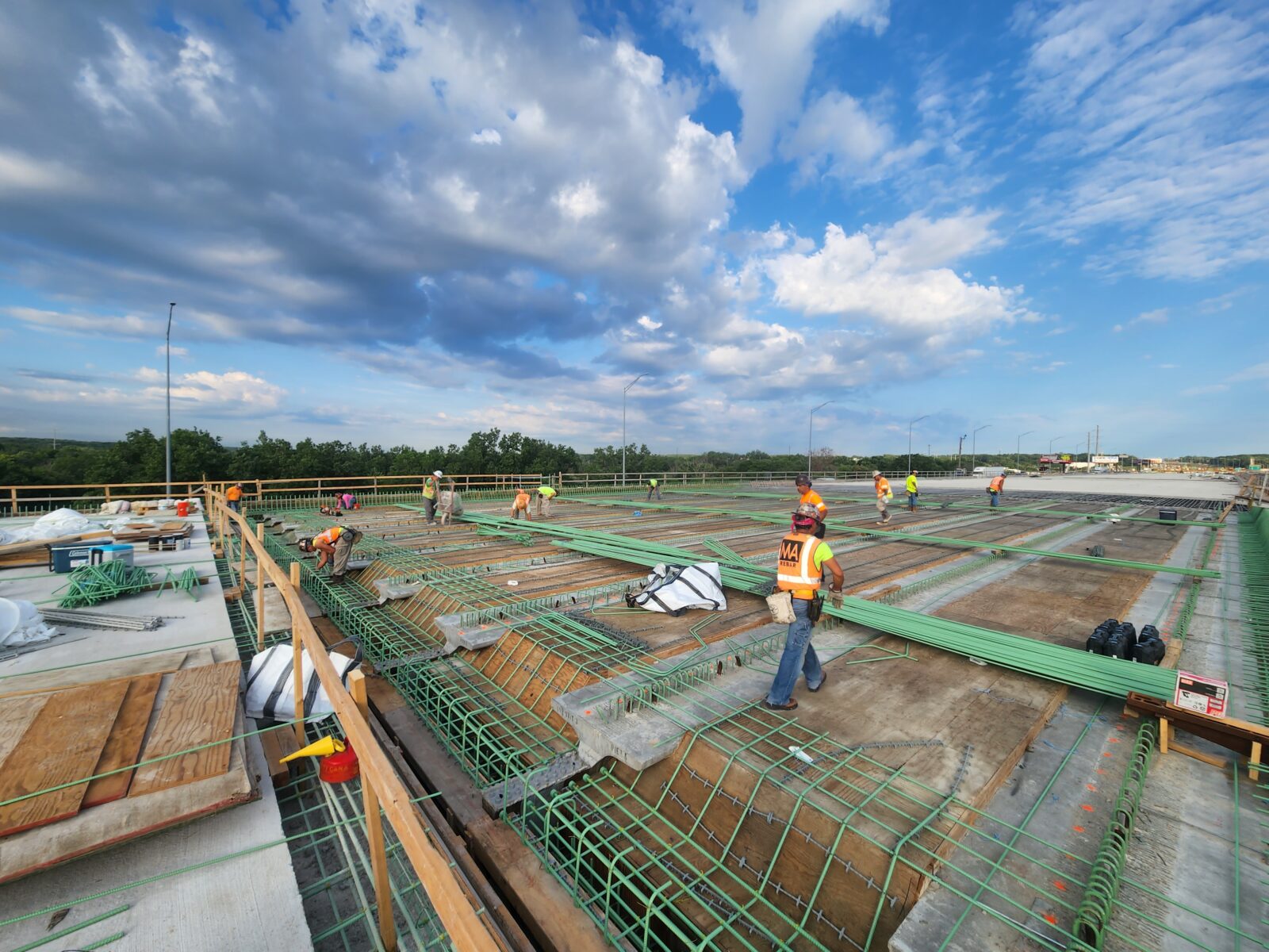 An image of workers placing rebar in preparation for pouring concrete.