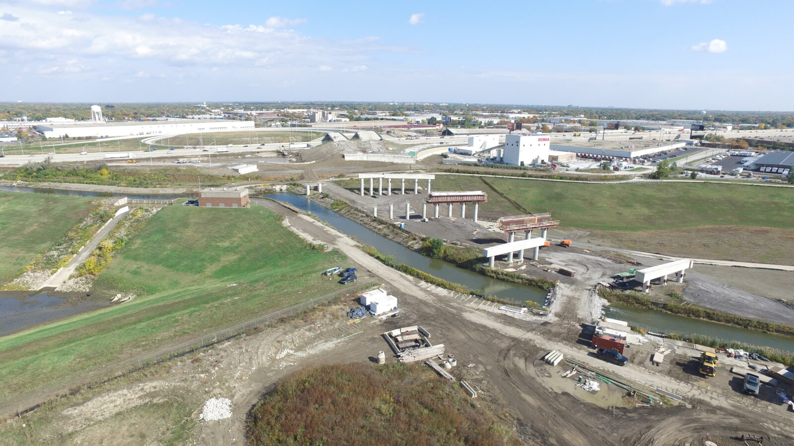 An image of a bridge under construction. So far, only the concrete supports are up.