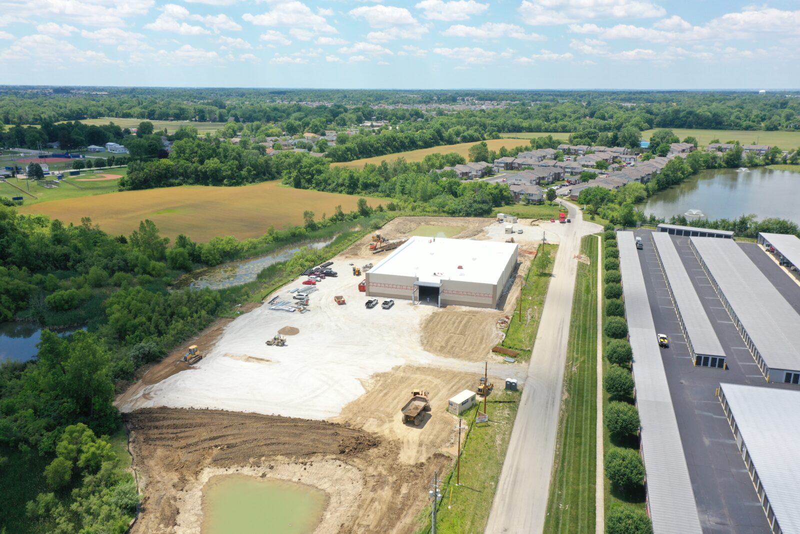 Aerial image of a Tractor Supply Co store and parking lot being constructed