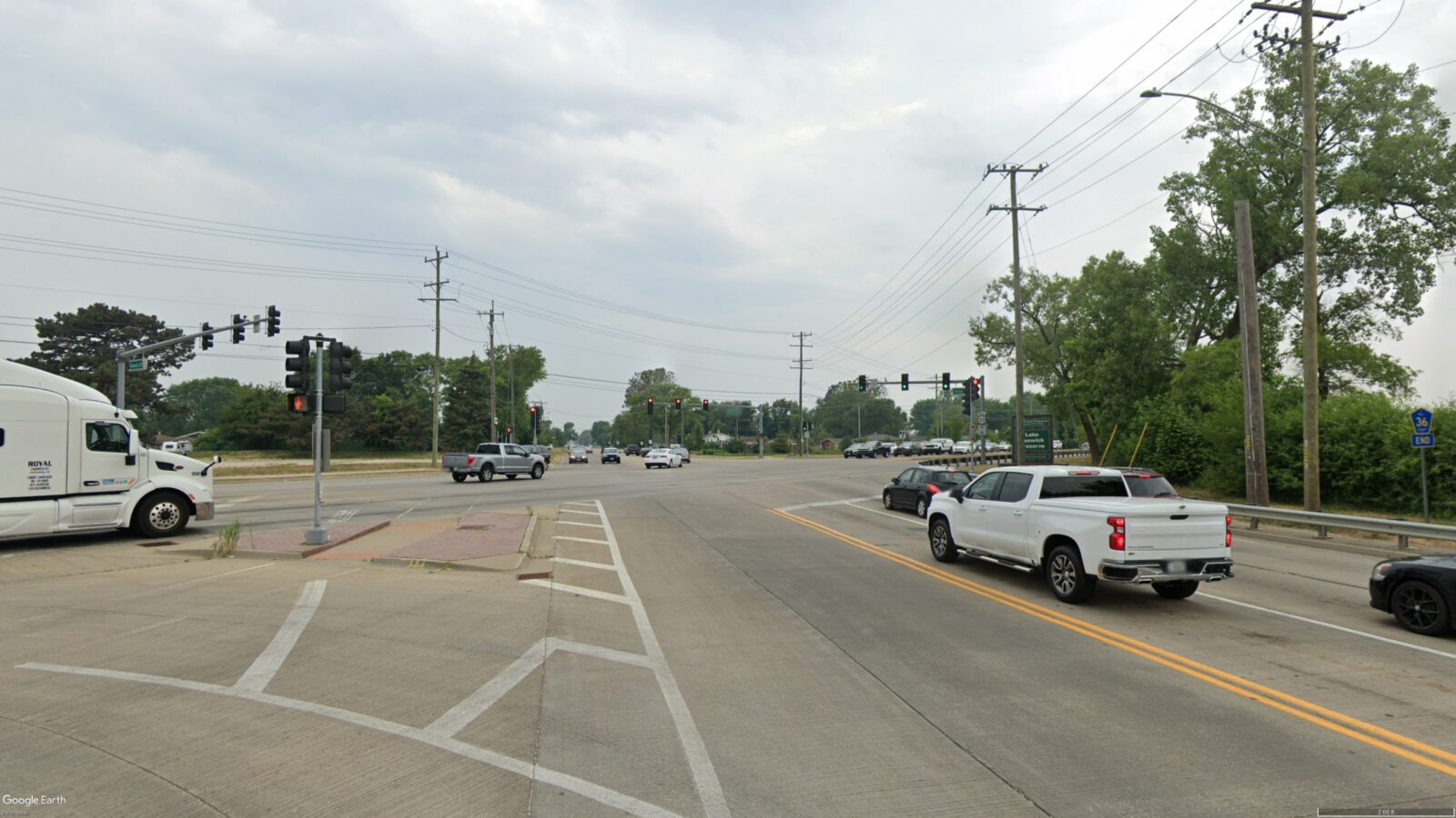 An image of an intersection, with the traffic signals visible.