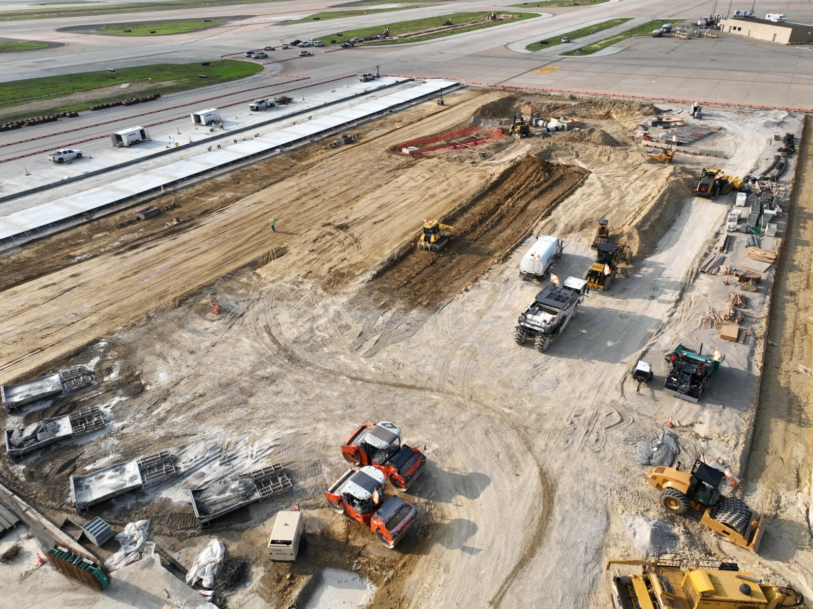 An image of a section of airport infield under construction.